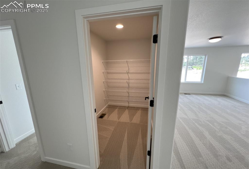 View of large finished storage area upstairs